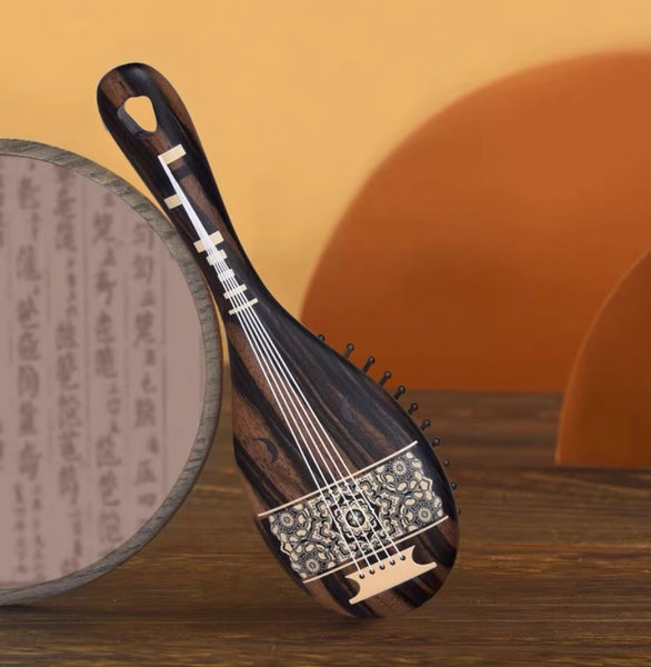 ELEVATE YOUR STYLE WITH EBONY WOOD HAIR BRUSHES AND COMBS